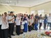 Bupati Elfianah Serahkan Dokumen Kependudukan Perdana kepada Siswa SMKN 1 Tanjung Raya